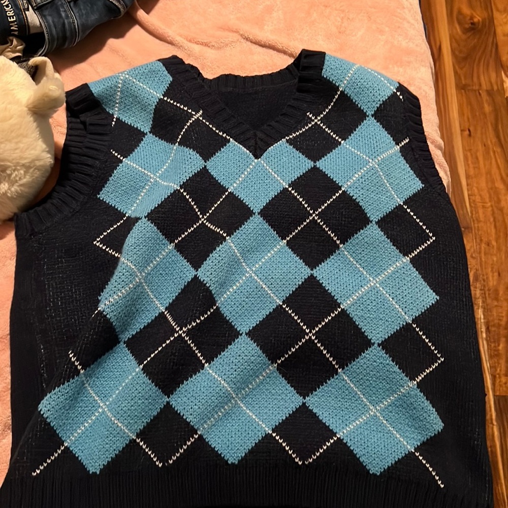 dark blue and light blue checkered vest